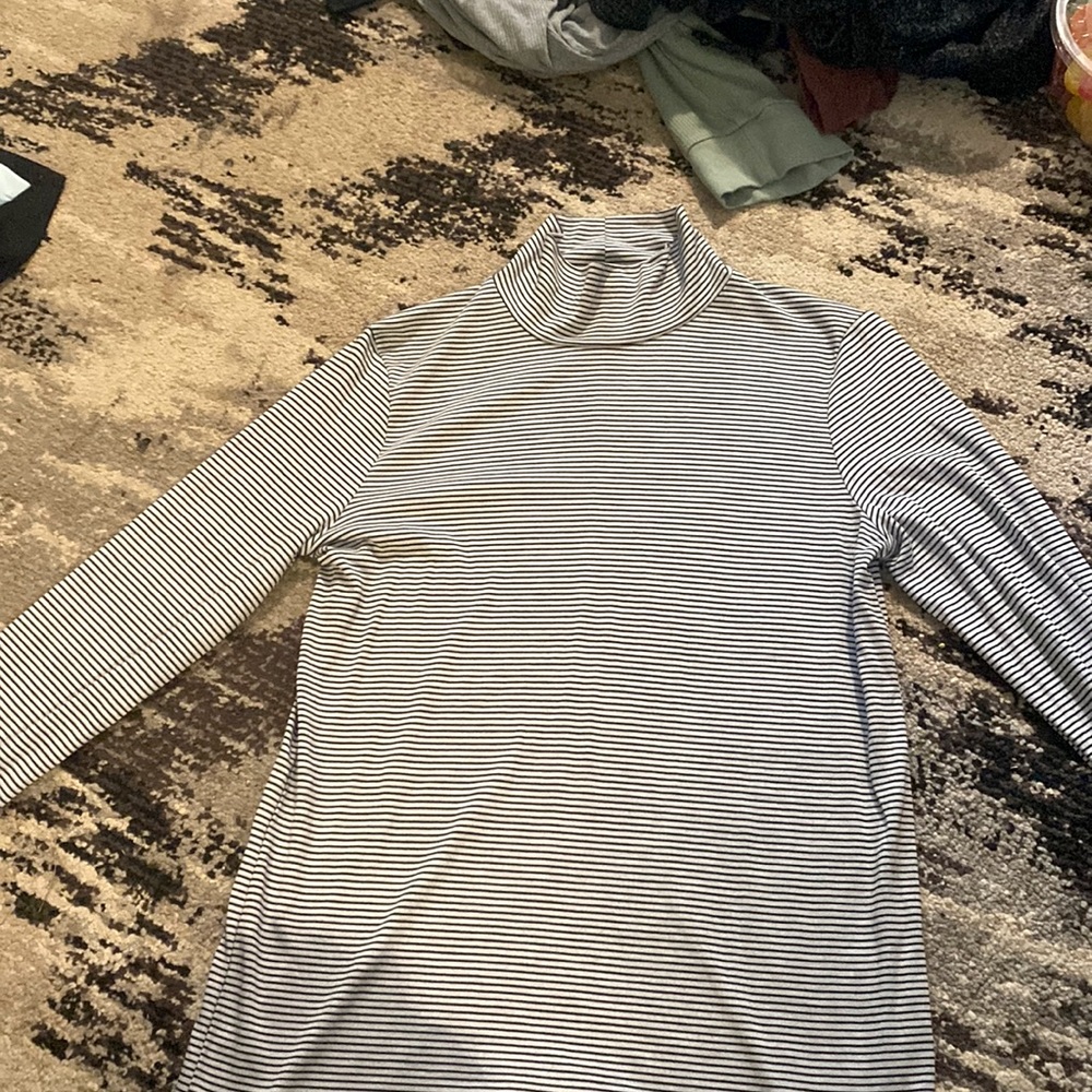 Banana Republic. Black and white stripped. Size Small turtle neck